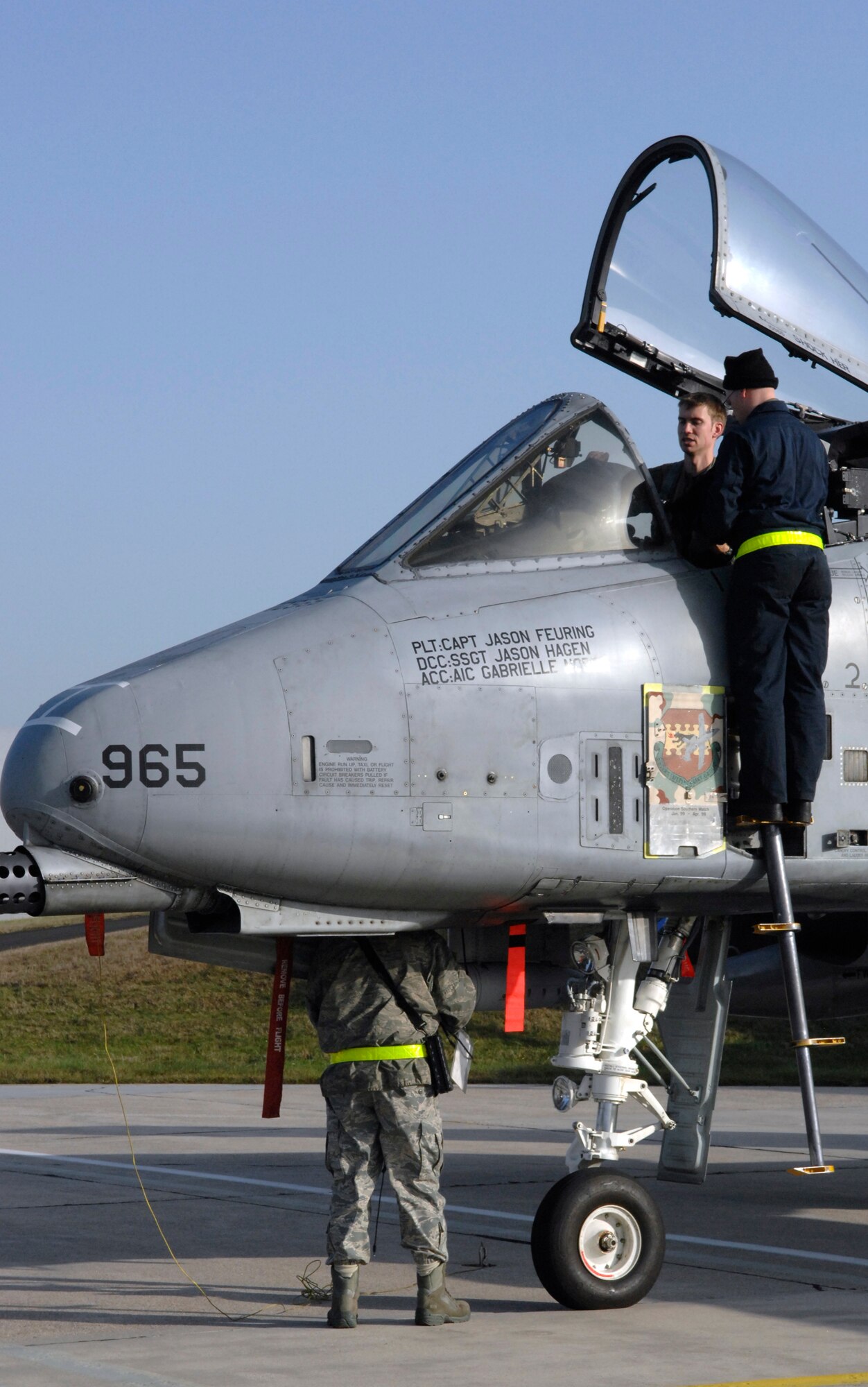 SPANGDHALEM AIR BASE, Germany – Capt. Gary Moore, 52nd Operations Group executive officer and A-10 Thunderbolt II pilot, speaks with a crew chief during a post-flight inspection here Nov. 20. The A-10 was part of a six-ship flying formation that flew to a simulated deployed location during Operation Saber Crown 10-02. (U.S. Air Force photo/Senior Airman Kali L. Gradishar)