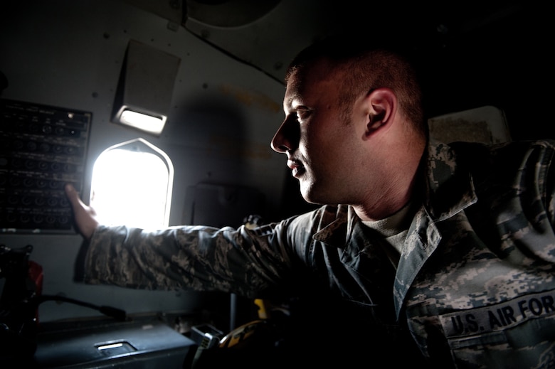 Staff Sgt. John Termun, 37th Aircraft Maintenance Unit crew chief, checks a circuit panel aboard a B-1B Lancer, Nov. 15, in Southwest Asia. The 37 AMU works to keep the B-1 operational and safe for missions in the U.S. Central Command area of responsibility. Sergeant Termun is deployed from Ellsworth Air Force Base, S.D. in support of operations Iraqi and Enduring Freedom. (U.S. Air Force photo/Staff Sgt. Robert Barney) 