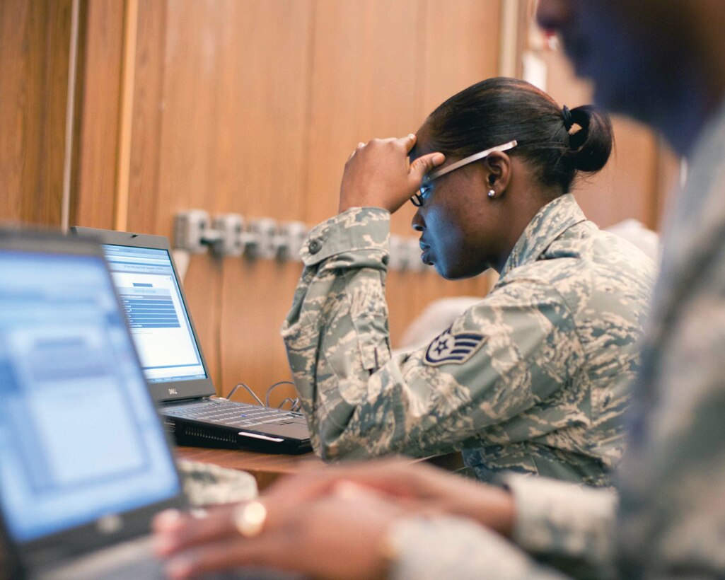 Staff Sgt. Marjorie Altino, 459th Aeromedical Evacuation Squadron medical technician, fills out a Public Health Assessment during a 459th Mobility Exercise Saturday. The purpose of the MOBEX is to ensure unit readiness for upcoming mobilizations taking place this spring. Public Health Assessments are engineered to gauge the general health of the Air Force and provide valuable statistical snapshots and insights in to the overall status of the force. (U.S. Air Force photo/ Capt. Nicholas Strocchia)