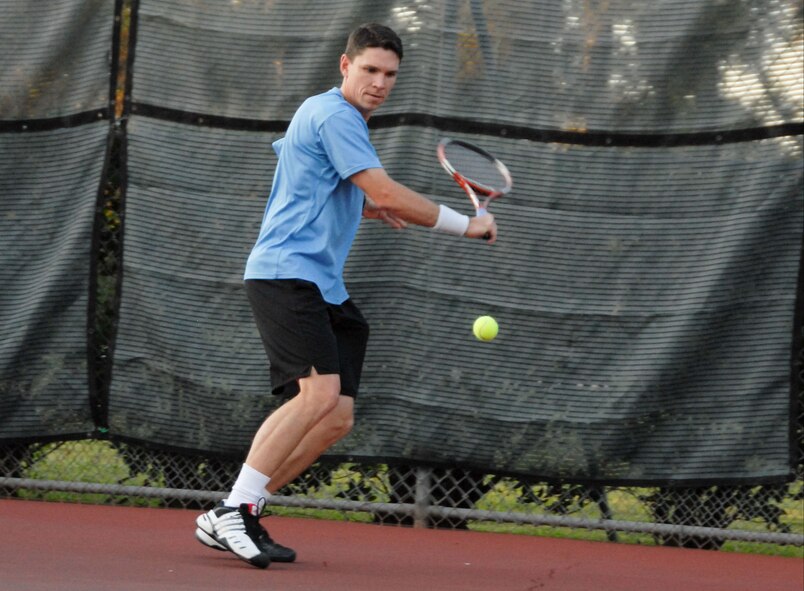 Student and faculty players from Air Command and Staff College won both singles and doubles titles from Air War College recently in Maxwell-Gunter intramural tennis competition. Singles winners were Maj. Kelvin Fan and Maj. Jim Hewitt (above). Doubles winners were Lt. Col. Tom Jahn and Navy Cmdr. Dan Heidt. The championship matches were played Nov. 3. (U.S. Air Force photo/Bennett Rock)

