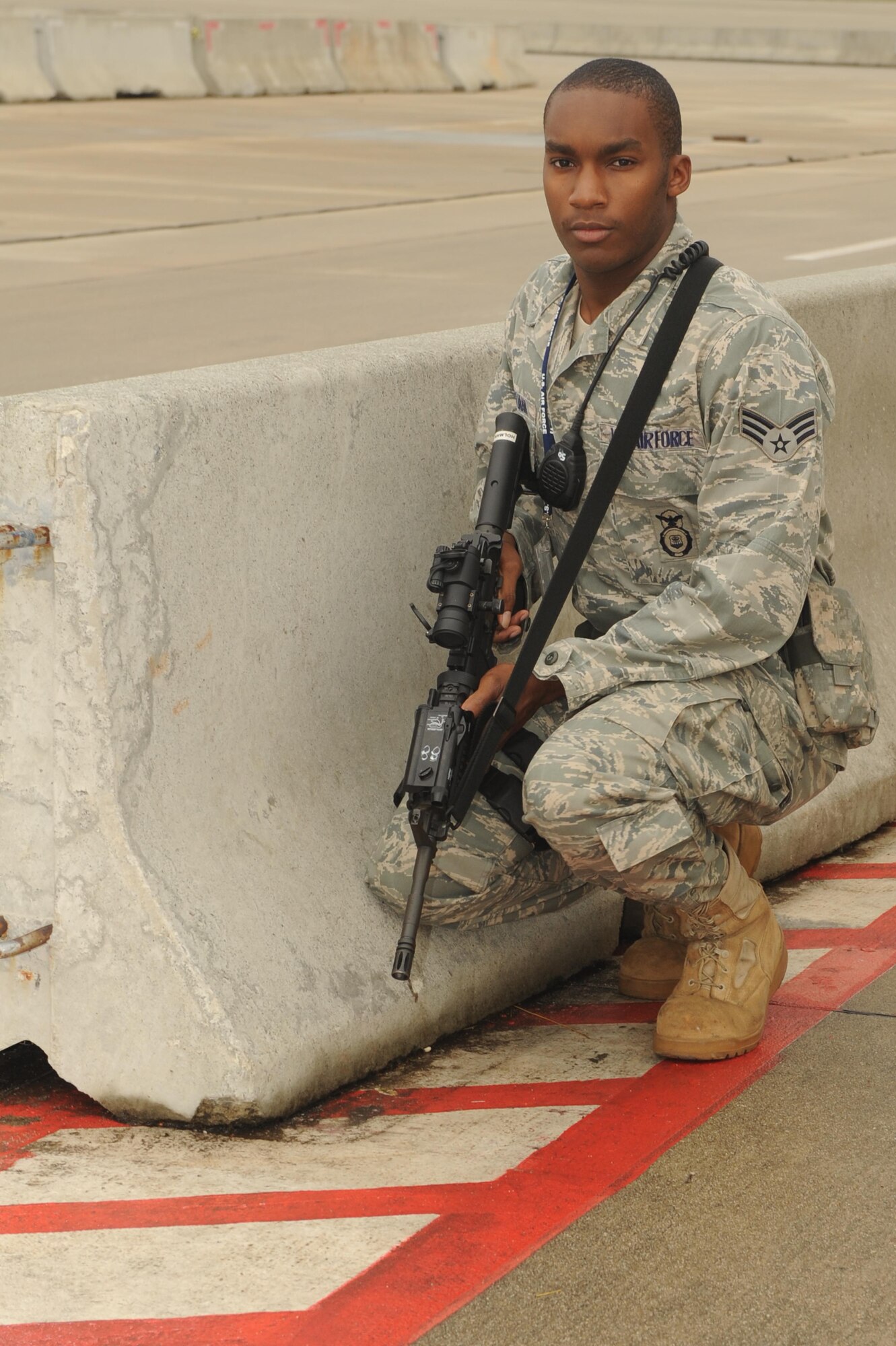 SHAW AIR FORCE BASE, S.C. -- Senior Airman Justin Holman, 20th Secuirty Forces Squadron, takes his position during the alert exercise Nov. 19. "I'm protecting the alert area and aircraft," Airman Holman said. From time to time for training purposes, an individual will act as an intruder during exercises, he added. "Security Forces proteect Alert assets 24/7," said Master Sgt. William Martin, alert NCO-in-charge. "The block off roads coming in and out of the alert area until the command post says it's okay to let people through." (U.S. Air Force photo/Senior Airman David Minor)