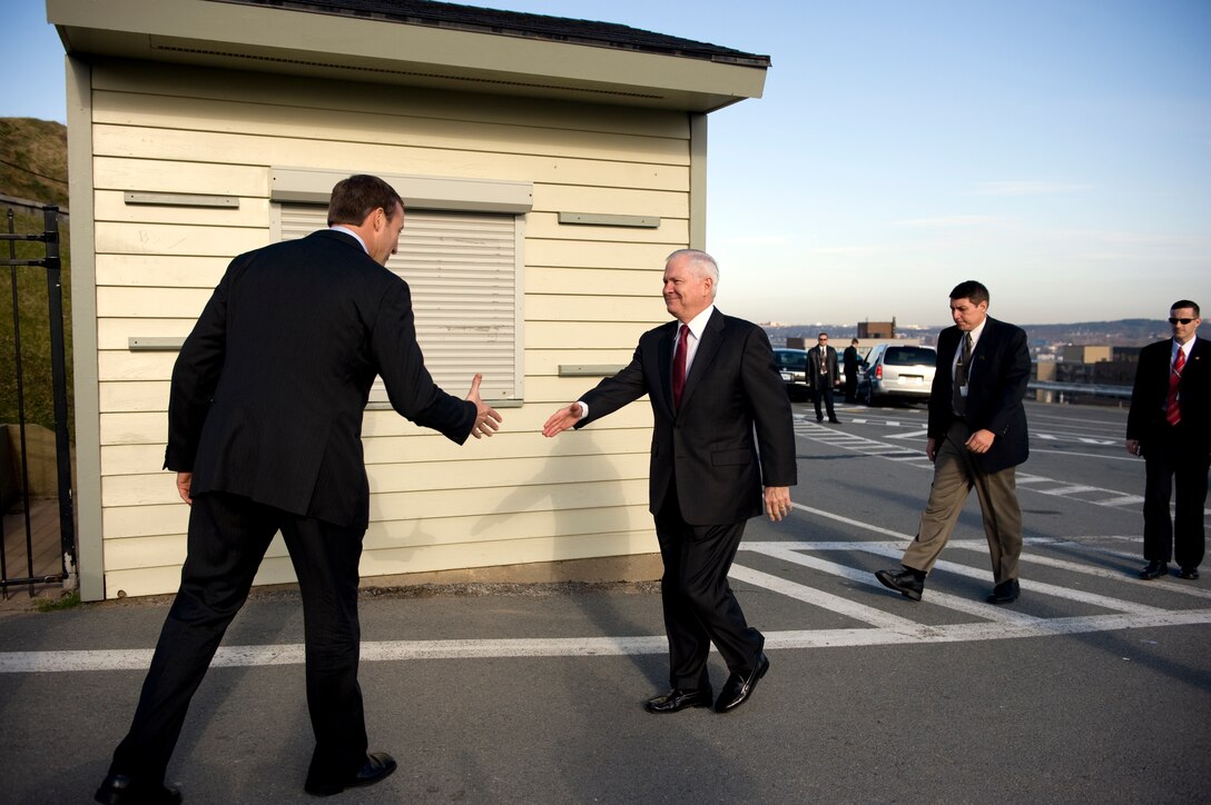 Canadian Minister of National Defense Peter MacKay, left, greets U.S. Defense Secretary Robert M. Gates upon his arrival at the Citadel in Halifax, Nova Scotia, Nov. 20, 2009.  