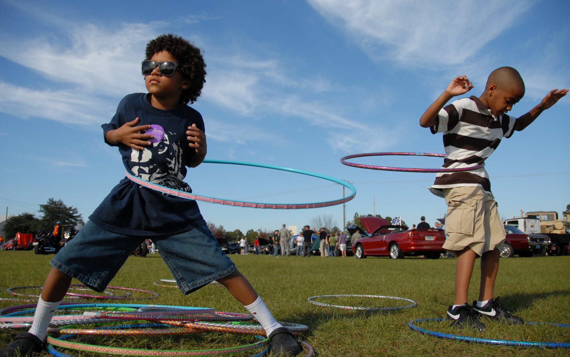 Kids work the hula-hoop during Duke Field’s Family Day event Nov. 7.  The Family Day event brought reservists and their families together for food, games and music.  (Air Force photo/Staff Sgt. Samuel King Jr.)
