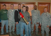 Mr. Shaud poses with fellow Duke Field maintainers following an informal retirement sendoff luncheon held in his honor Nov. 20. (U.S. Air Force photo/Staff Sgt. Jon McCallum)
