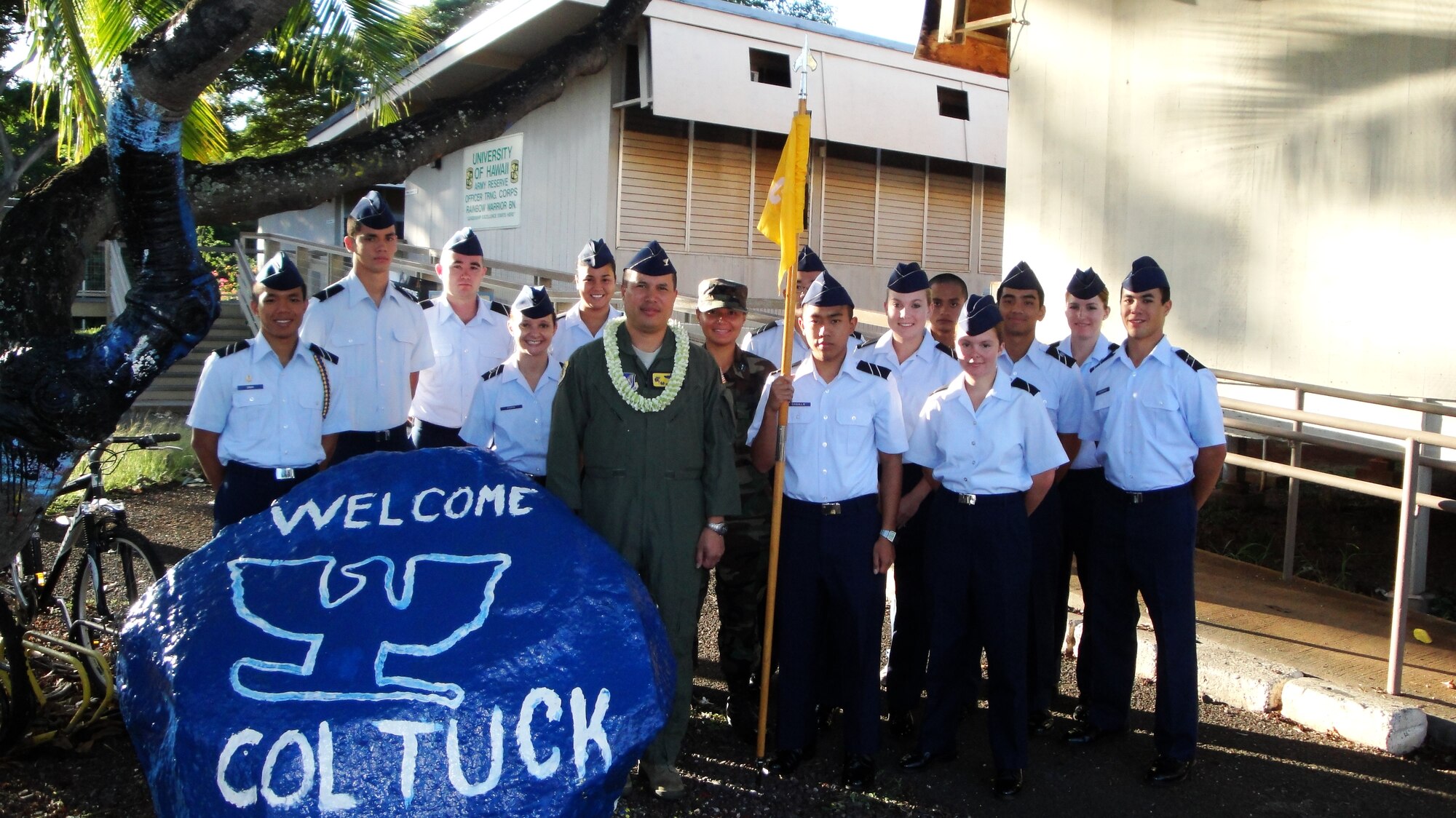 HONOLULU -- Col. Giovanni Tuck, 15th Airlift Wing commander, poses with the 175th Air Force Reserve Officer Training Corps Cadet Wing at the University of Hawaii at Manoa Nov. 12. Colonel Tuck spent a day with the cadets speaking about the Air Force legacy and the importance of mentoring. (Courtesy photo)