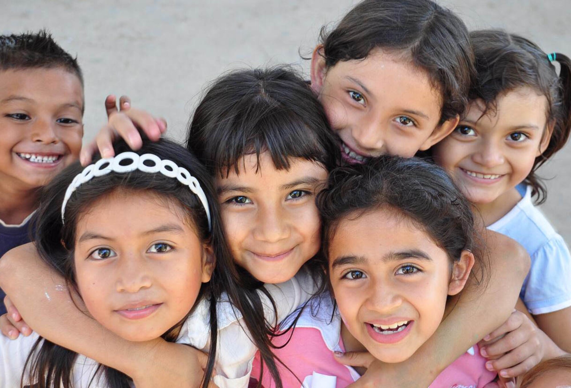 ILOPANGO, El Salvador – Some children pose for a picture Nov. 20 in San Diego, El Salvador. JTF-Bravo Medical Element performed a Medical Civil Action Program, or MEDCAP, from Nov. 19 to 23 treating 2,987 people in several different cities affected by the El Salvador mudslides. The MEDEL personnel distributed more than $23,000 in medical supplies during the MEDCAP. The medicines ranged from prescription medicine to common pain-killers (U.S. Air Force photo/Staff Sgt. Chad Thompson).