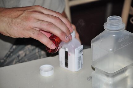 ILOPANGO, El Salvador – Air Force Master Sgt. Matthew Hurless, medical element pharmacy technician, prepares some antibiotics Nov. 20 in San Diego, El Salvador. JTF-Bravo Medical Element performed a Medical Civil Action Program, or MEDCAP, from Nov. 19 to 23 treating 2,987 people in several different cities affected by the El Salvador mudslides. The MEDEL personnel distributed more than $23,000 in medical supplies during the MEDCAP. The medicines ranged from prescription medicine to common pain-killers (U.S. Air Force photo/Staff Sgt. Chad Thompson).