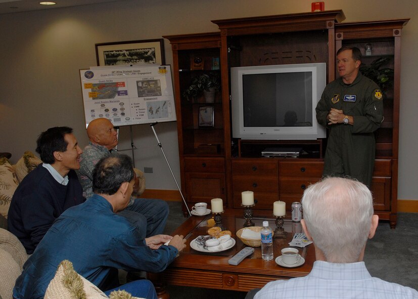 Members of the Air Force Civilian Advisory Council listed to a briefing by Brig. Gen. Phillip Ruhlman, 36th Wing Commander, during a refueling stop at Andersen Air Force Base, Guam Nov. 23. The group of four AFCAC members joinged Gen. Gary North, Pacific Air Forces commander, on a tour to Kunsan and Osan Air Bases, Republic of Korea Nov. 21-26. The purpose of the trip is for General North to celebrate Thanksgiving with the Airmen and for the civic leaders to get a better understanding of life for Airmen who are assigned to ROK. (U.S. Air Force photo/Tech. Sgt. Jerome S. Tayborn)
