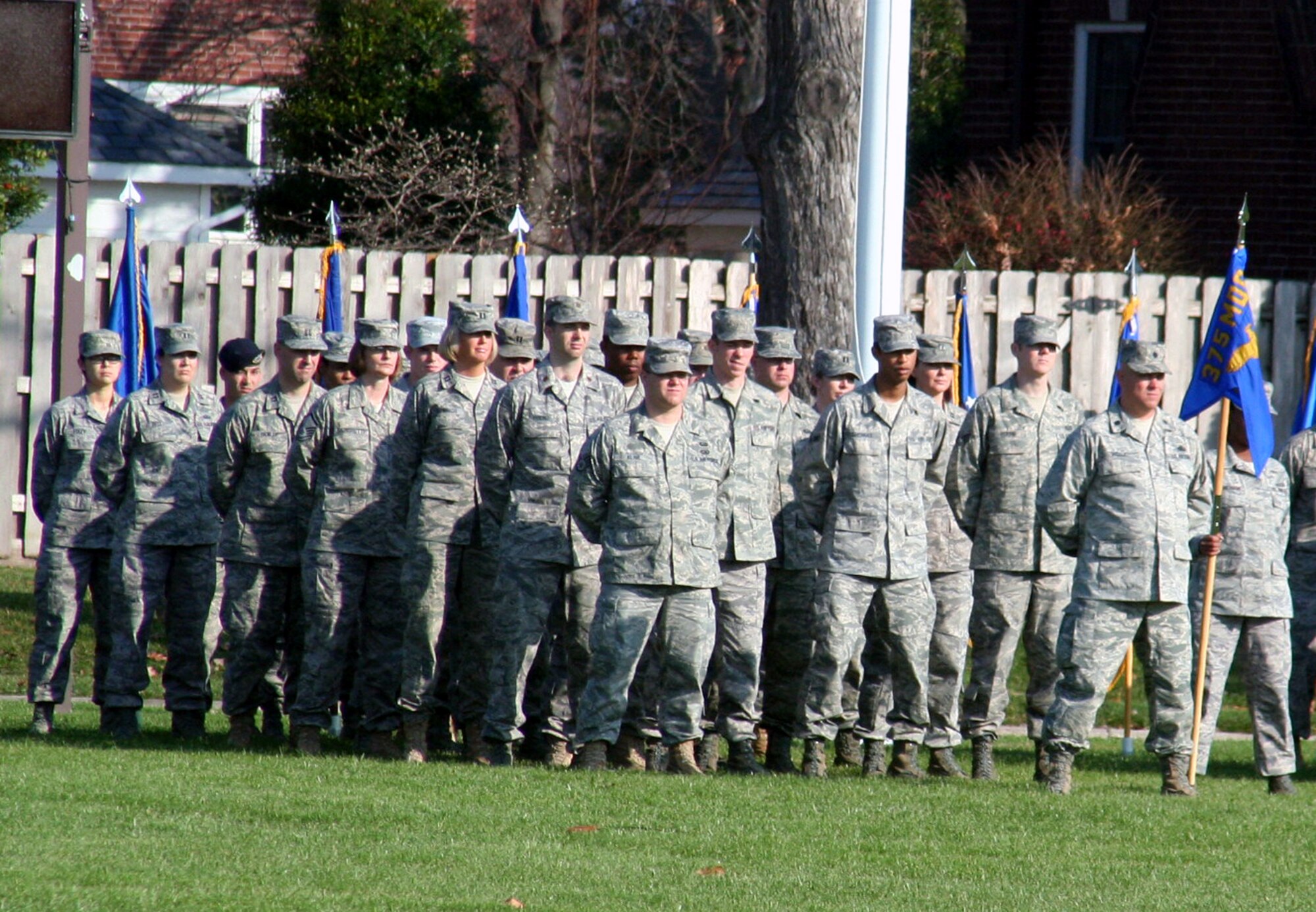 Air Mobility Command Airmen stand in formation during the AMC change of command ceremony on Nov. 20, 2009, at Scott Air Force Base, Ill.  During the ceremony, Gen. Raymond E. Johns took command of AMC. (U.S. Air Force Photo/Tech. Sgt. Scott T. Sturkol)