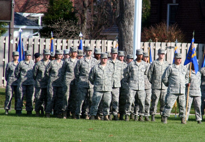 Air Mobility Command Airmen stand in formation during the AMC change of command ceremony on Nov. 20, 2009, at Scott Air Force Base, Ill.  During the ceremony, Gen. Raymond E. Johns took command of AMC. (U.S. Air Force Photo/Tech. Sgt. Scott T. Sturkol)