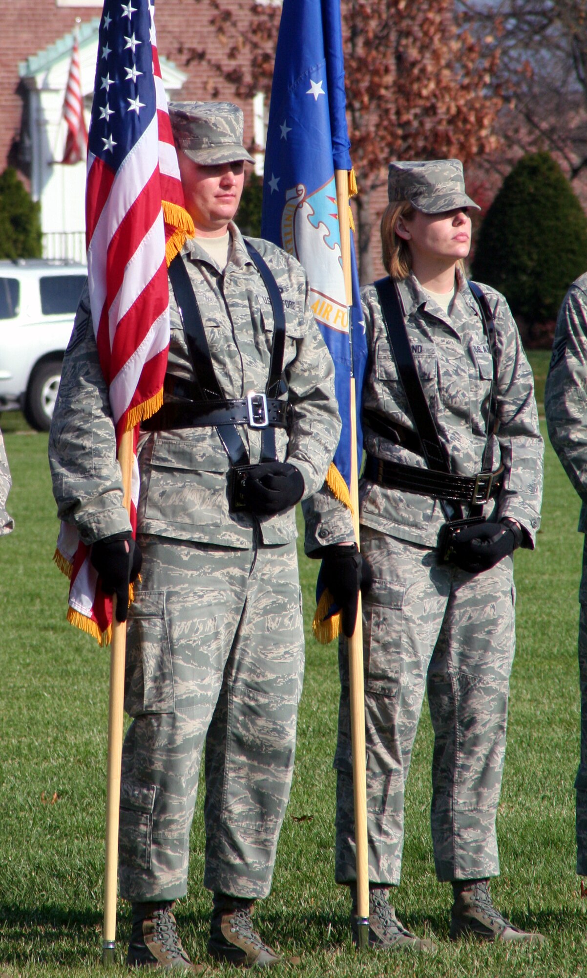 Airmen assigned to the color guard participate in the Air Mobility Command change of command ceremony on Nov. 20, 2009, at Scott Air Force Base, Ill.  During the ceremony, Gen. Raymond E. Johns took command of AMC. (U.S. Air Force Photo/Tech. Sgt. Scott T. Sturkol)