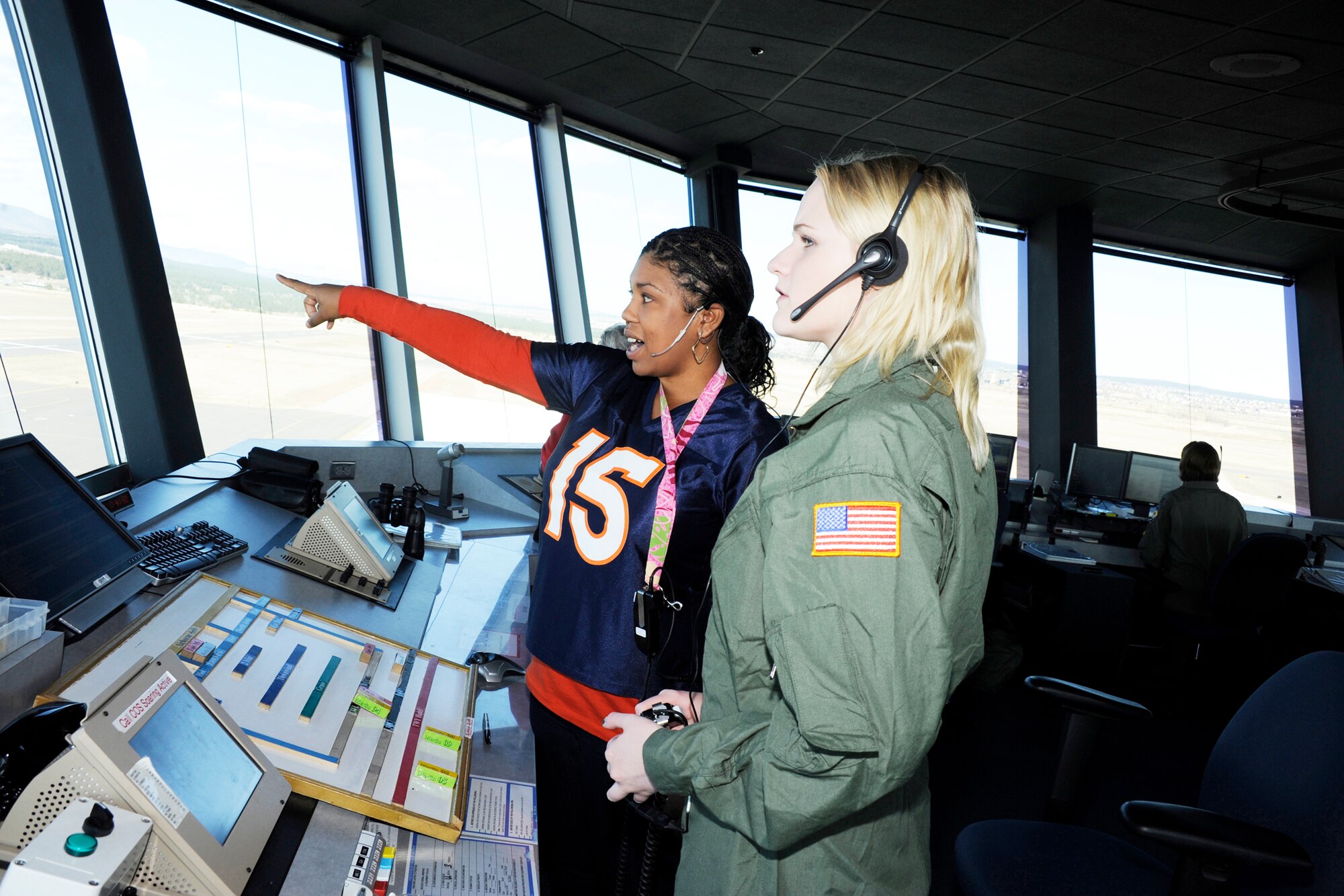 Hannah Marklin of Parker, Colo., receives a tour of the U.S. Air Force Academy air traffic control tower Nov. 13, 2009.  She was visiting the Academy as "Cadet for a Day."  The program is a collaboration with the Colorado Make-a-Wish Foundation to provide young people facing severe medical challenges the opportunity to experience life as a cadet.  Hanna's visit was hosted by Cadet Squadron 31.  Academy cadets have hosted 32 youths since the program's inception. (U.S. Air Force photo/Bill Evans)