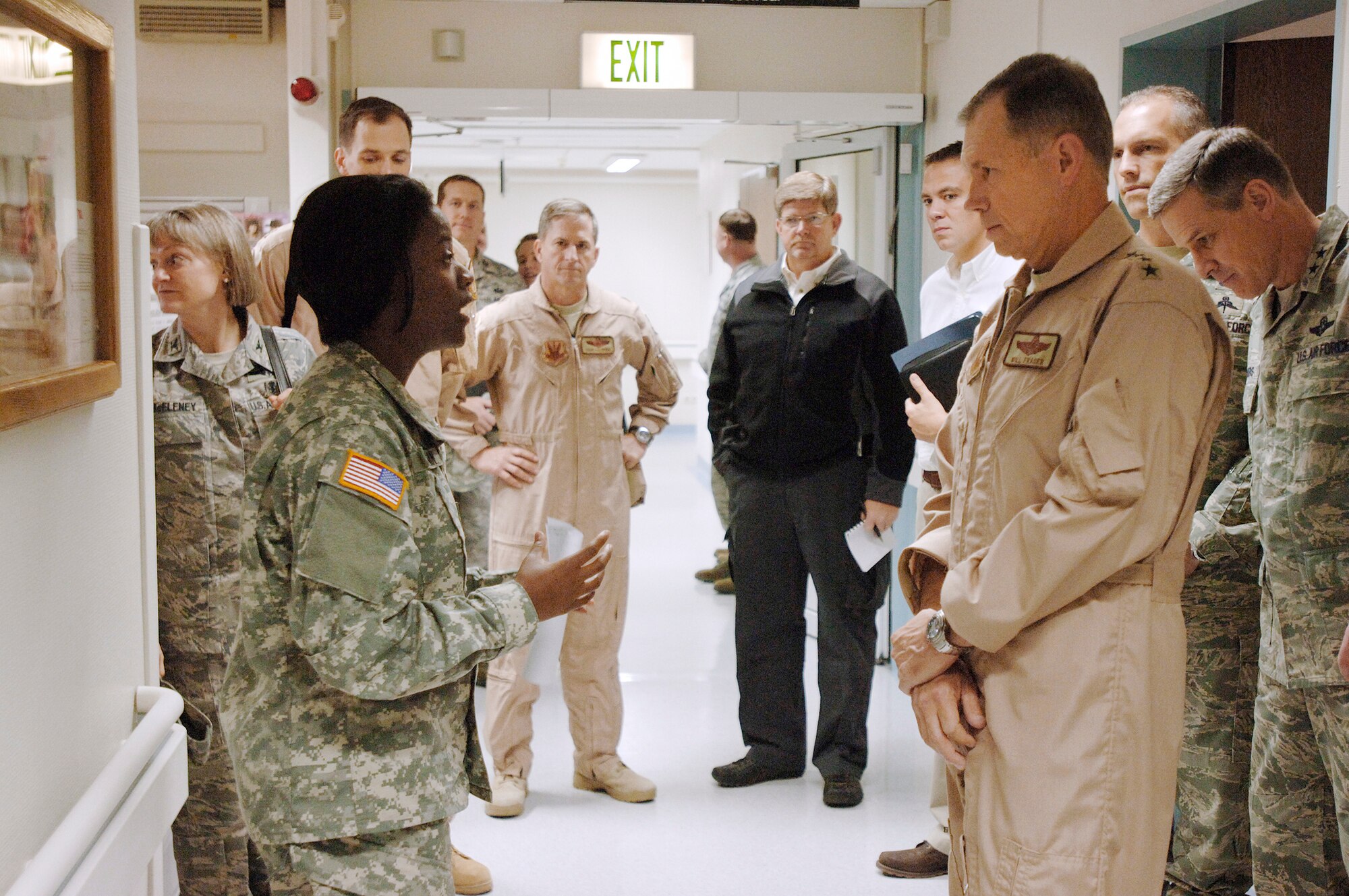 Gen. William M. Fraser III, visits Landstuhl Regional Medical Center, Nov. 20, 2009, where he is briefed by  Army Capt. Ebony Peterman, who led a tour through the hospital's surgical ward to visit wounded U.S. and coalition service members. Since 2004, the hospital has treated more than 58,000 wounded U.S. and coalition servicemembers and civilians injured in Iraq and Afghanistan. General Fraser is the commander of Air Combat Command and Captain Peterman is a charge nurse. (Defense Department photo/Master Sgt. Scott Wagers/Defense Media Activity Ramstein)