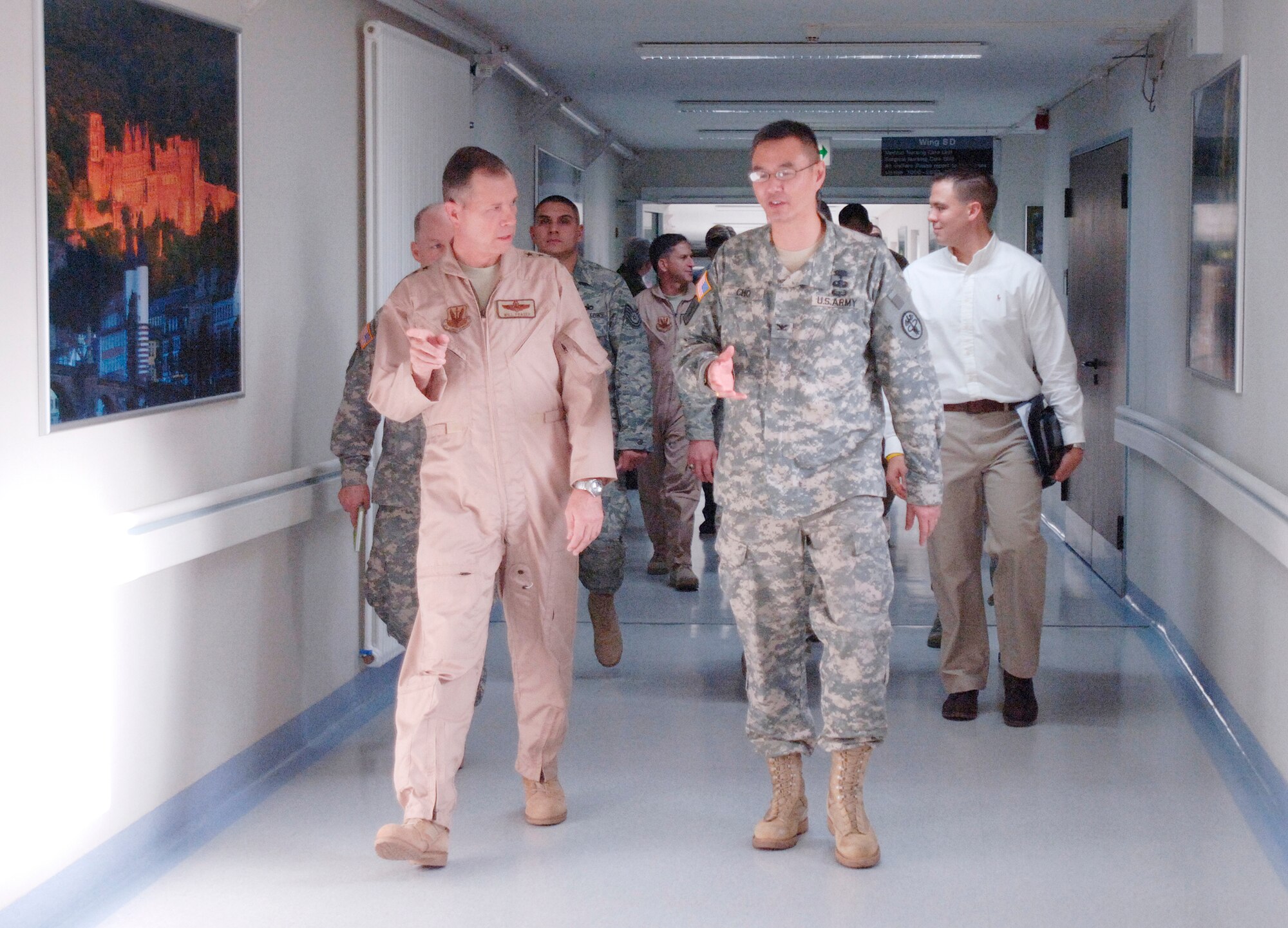 Gen. William M. Fraser III, (left) visits Landstuhl Regional Medical Center, Germany, Nov. 20, 2009, where he met U.S. Army Col. John Cho, (right), who led a tour visiting hospital staff and wounded U.S. and coalition servicemembers. Since 2004, the hospital has treated more than 58,000 wounded U.S. and coalition servicemembers and civilians injured in Iraq and Afghanistan. General Fraser is the commander of Air Combat Command and Colonel Cho is the hospital commander. (Defense Department photo/Master Sgt. Scott Wagers/Defense Media Activity Ramstein) 