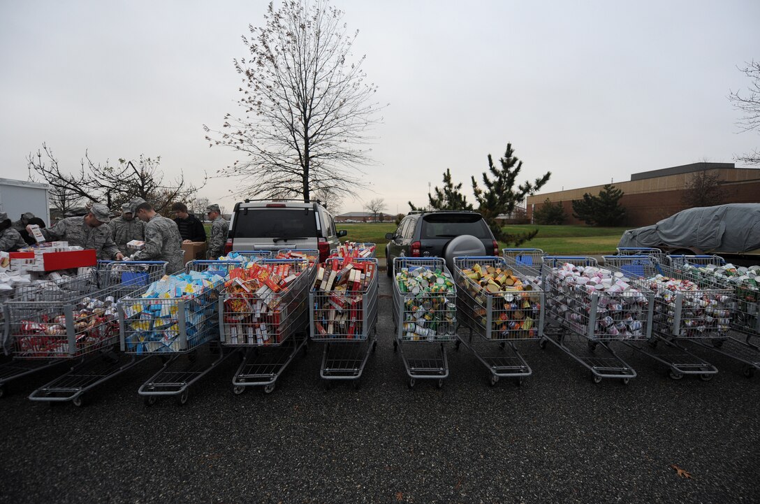 LANGLEY AIR FORCE BASE, Va. – Carts full of Thanksgiving favorites await distribution during Operation Warmheart Nov. 23. Operation Warmheart is a First Sergeants' Association community outreach program designed to support Airmen and their families during the holiday season. (U.S. Air Force photo/Airman Rebecca Montez)