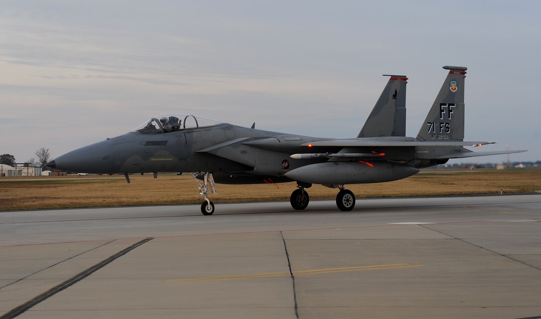 LANGLEY AIR FORCE BASE, Va. -- Lt. Col. Edward Corcoran, 71st Fighter Squadron commander, returns Nov. 21 after supporting a weapons school course at Nellis Air Force Base, Nev. Colonel Corcoran and his team contributed weapons systems and adversary role support to pilots training there. (U.S. Air Force photo/Airman Rebecca Montez)