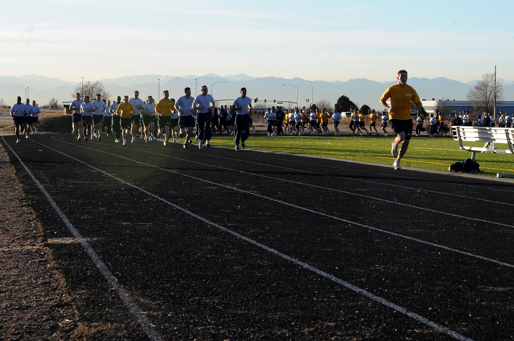 BUCKLEY AIR FORCE BASE, Colo. -- Members of Team Buckley run during the Warfit Challenge  Nov. 20. The base hosts the monthly challenge to promote physical fitness and esprit de corps. (U.S. Air Force photo by Senior Airman Erika Brooke)