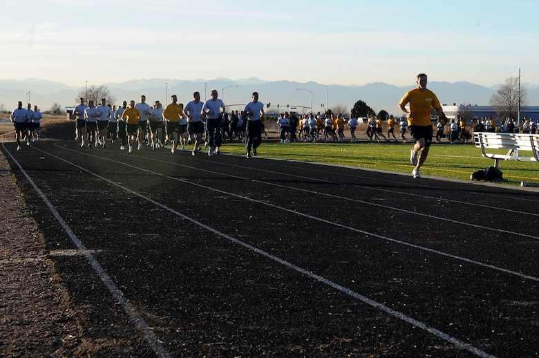 BUCKLEY AIR FORCE BASE, Colo. -- Members of Team Buckley run during the Warfit Challenge  Nov. 20. The base hosts the monthly challenge to promote physical fitness and esprit de corps. (U.S. Air Force photo by Senior Airman Erika Brooke)