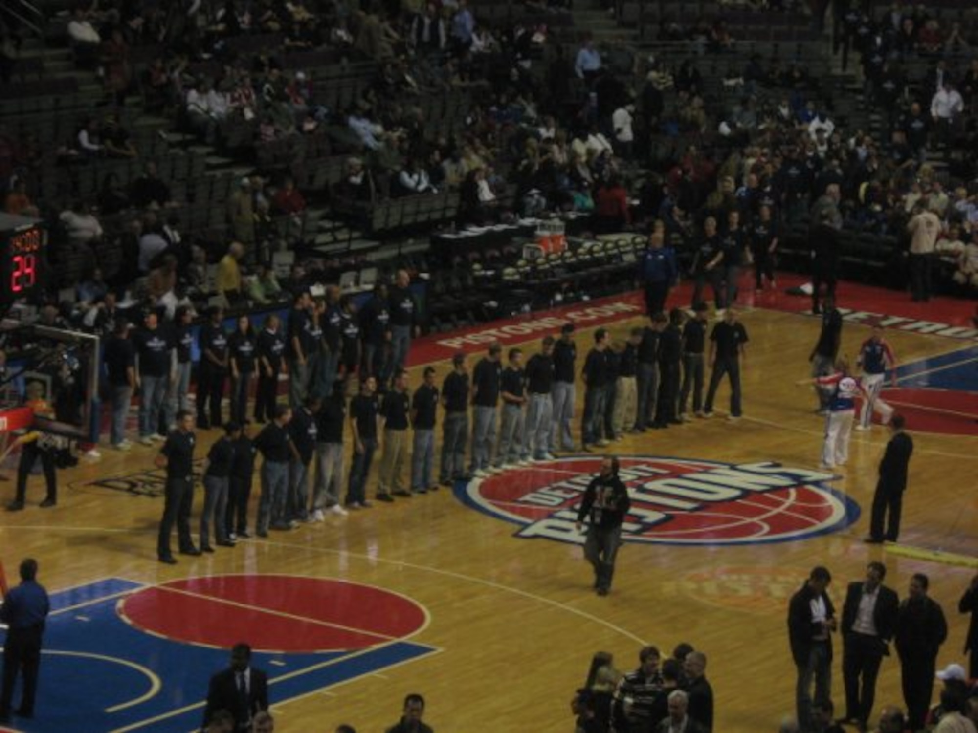 A mass enlistment if 141 new Air Force recruits in the delayed enlistment program during the Military Appreciation Night at a Detroit Pistons game in Michigan. The mass enlistment was shown live on national and local television. (U.S.Air Force photo/Sylvia Mulshine)