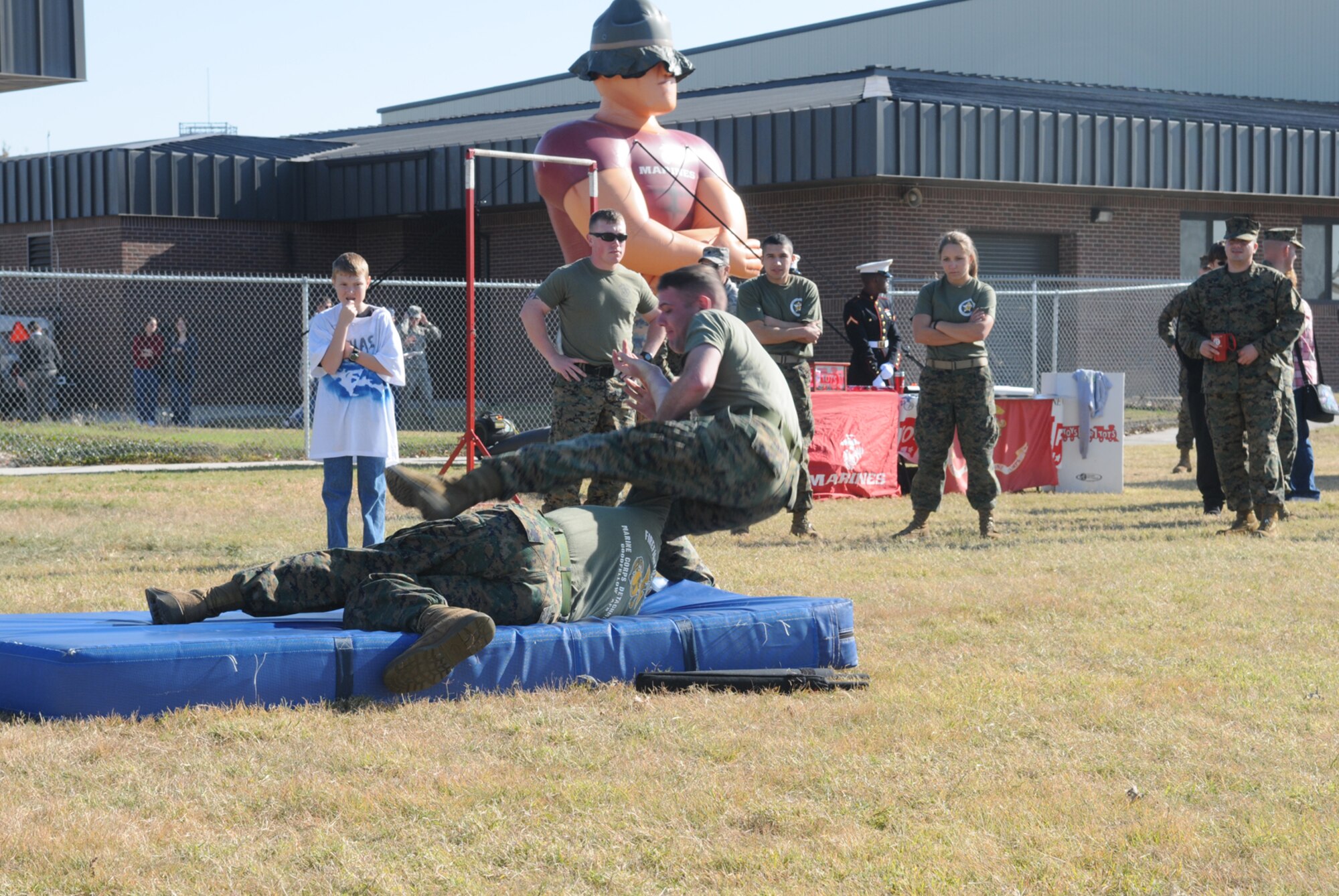 GOODFELLOW AIR FORCE BASE, Texas -- Members of the Marine Corps Detachment demonstrate techniques from the Marine Corps Martial Arts Program during Community Appreciation Day, Nov. 21, 2009. Other events during the day included military working dog demonstrations, firefighting exercises, a live demonstration of military operations in urban terrain, and a bus tour of the base. (U.S. Air Force photo/Airman Clayton Lenhardt)
