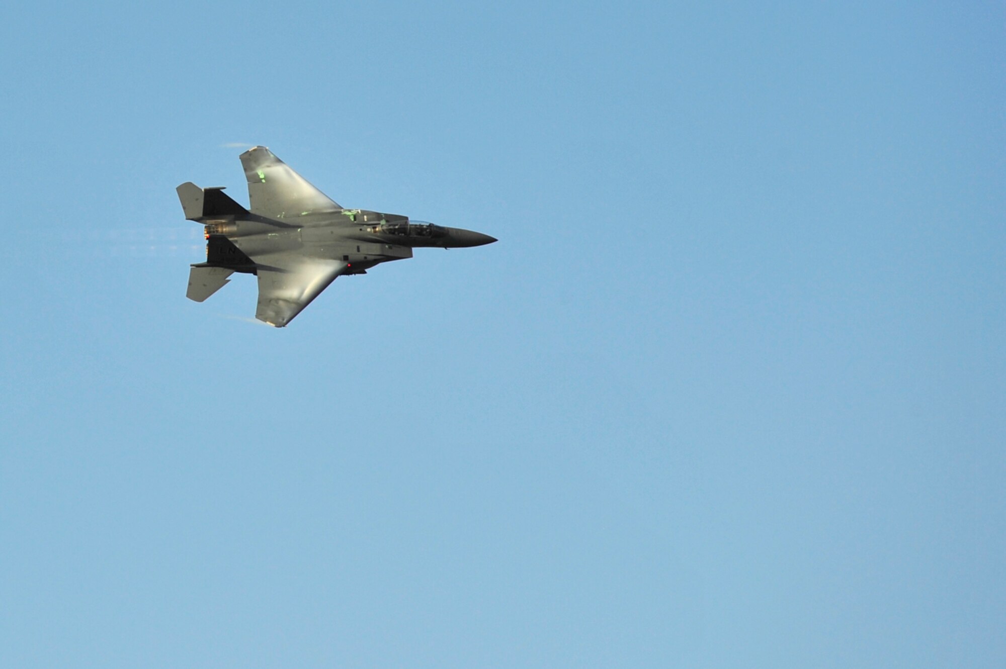 DUBAI, United Arab Emirates - An F-15E Strike Eagle flies over the Dubai Air Show Nov. 15, 2009. The F-15 Fighter uses two crew members, a pilot in the front seat and a weapon systems officer in the rear cockpit. (U.S. Air Force photo/Tech. Sgt. Charles Larkin Sr)