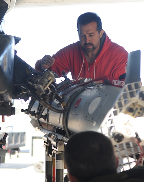 Barksdale AFB, La. – Tech. Sgt. Robert Carter, 917th Aircraft Maintenance Squadron makes sure the Miniature Air-Launched Decoy is attached properly to the B-52H before take-off the next day. During the testing, the 49th Test and Evaluation Squadron provided B-52 test flights, coordinated with different agencies for support and built modeling simulation scenarios. (U.S. Air Force photo by Senior Airman Alexandra M. Longfellow) (RELEASED)