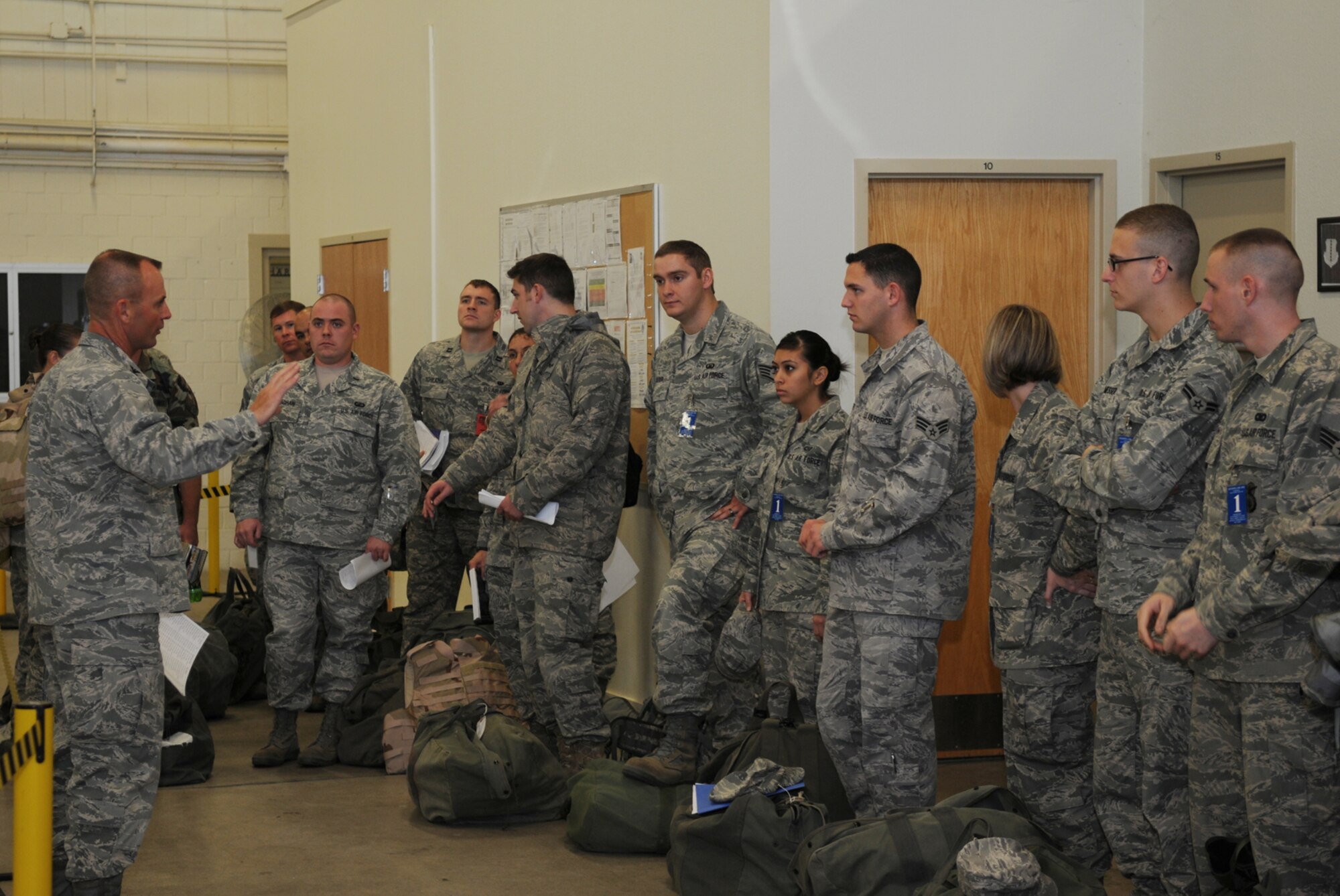GOODFELLOW AIR FORCE BASE, Texas -- Col. Guy Parker, 17th Mission Support Group commander, briefs his troops during a deployment exercise, Nov. 18, 2009. Deployment exercises test Goodfellow's ability to deploy in response to real world situations. (U.S. Air Force photo/Airman 1st Class Clayton Lenhardt)
