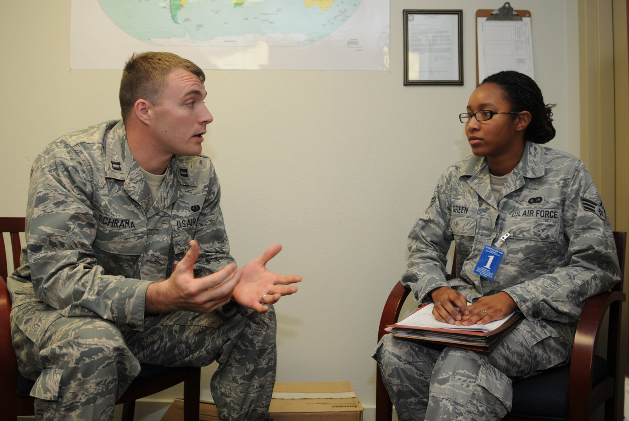 GOODFELLOW AIR FORCE BASE, Texas -- Capt. Michael Schrama provides "legal advice" to Senior Airman Kashouna Green during a deployment exercise, Nov. 18, 2009. Captain Schrama and Airman Green are both assigned to the 17th Training Wing. Deployment exercises test Goodfellow's ability to deploy in response to real world situations. (U.S. Air Force photo/Airman 1st Class Clayton Lenhardt)