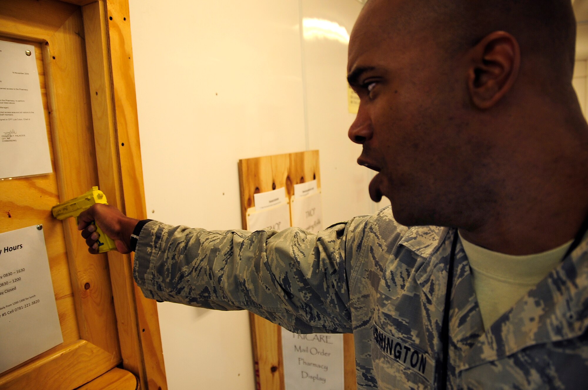 ALI BASE, Iraq -- U.S. Air Force Tech. Sgt. Antoine Washington, 732 Provost Marshall Office/ Det 5, plays the role of the perpetrator during an active shooter scenario at the combat support hospital here, Nov. 19, 2009. The scenario is designed to help train PMO members on responding to emergency situations involving an active gunman. (U.S. Air Force photo/ Senior Airman Tony R. Ritter)