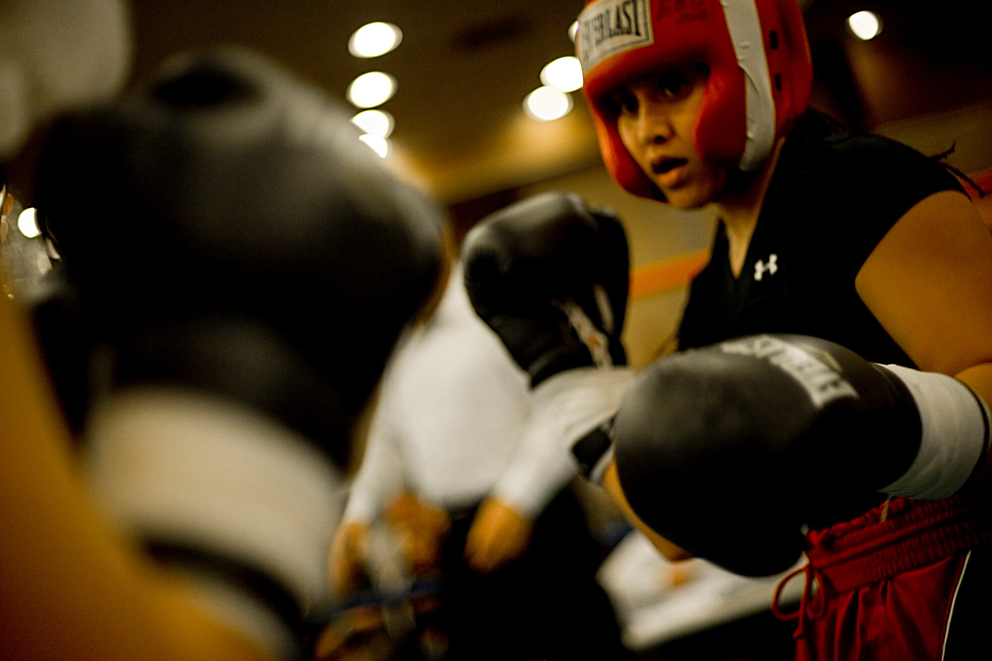 MISAWA AIR BASE, Japan -- Jessie Ramirez, a Phoenix native, squares up against Yuki Satou during the first female Friday Night Fight Night match Nov. 20 at the Collocated Club. Ramirez was declared winner by technical knockout.  (U.S. Air Force photo/Senior Airman Jamal D. Sutter)