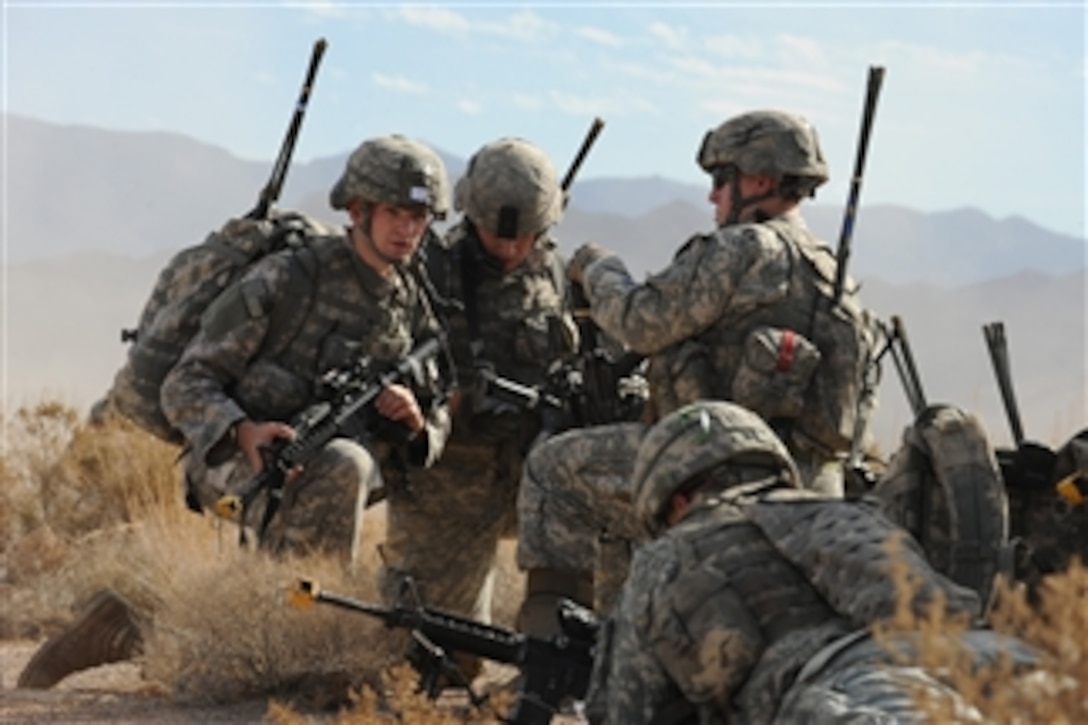 U.S. Army soldiers with the 173rd Cavalry Airborne Reconnaissance Squadron, Fort Bragg, N.C., set up a perimeter during a Mobility Air Forces Exercise at the Nevada Test and Training Range in the desert of southern Nevada on Nov. 18, 2009.  The soldiers are taking part in the bi-annual U.S. Air Force Weapons School exercise, which provides realistic training for combat Air Force, mobility Air Force and U.S. Army personnel.  Approximately 40 C-17 and C-130 aircraft from Air Force bases around the world dropped approximately 400 soldiers on the training range.  The exercise also allows soldiers the opportunity to use range facilities to conduct urban ground operations training.  