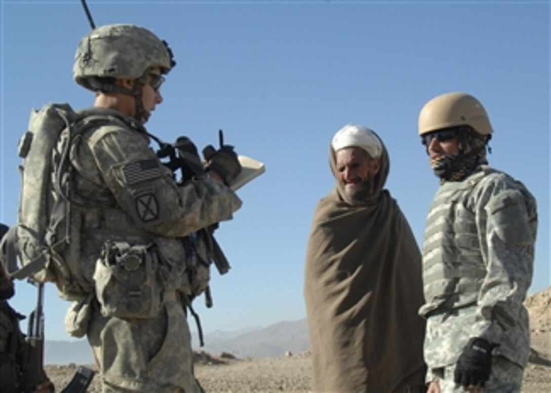 U.S. Army 1st Lt. Alicia Morrison speaks with an Afghan elder about issues and concerns in his village in the Logar province of Afghanistan on Nov. 19, 2009.  Morrison is assigned to Alpha Company, 710 Brigade Support Battalion, 3rd Brigade Combat Team, 10th Mountain Division.  