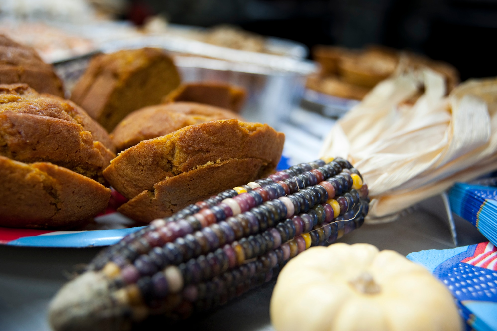 MISAWA AIR BASE, Japan -- Pumpkin bread and other deserts line a potluck table at the 373rd Intelligence, Surveillance and Reconnaissance Group's Annual Turkey Feed at their dormitory Nov. 23. This event is one of several that military units at Misawa Air Base host to give a sense of family despite the distance from their hometowns. (U.S. Air Force photo/Staff Sgt. Samuel Morse)