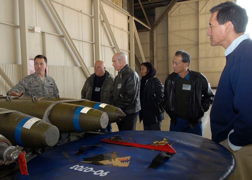 Col. Robert Givens, 8th Fighter Wing commander, briefs Steven Ai, Robin Campaniano, Les Enderton, and Anthony Guerrero, Jr., on missile fuses Nov. 23 at Kunsan Air Base, Republic of Korea. The group of Air Force Civilian Advisory Committee members are touring Kunsan and Osan Air Bases, ROK, Nov. 21-26  The purpose of the trip is for General North to celebrate Thanksgiving with the Airmen and to provide the civic leaders a better understanding of life for Airmen assigned to the ROK. (U.S. Air Force photo/Tech. Sgt. Jerome S. Tayborn) 