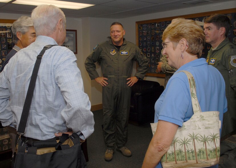 Gen. Gary North, Pacific Air Forces commander, greets Les Enderton, Executive Director of the Oahu Visitors Bureau, and other members of the Air Force Civilian Advisory Council as they arrived at the distinguished visitor lounge at Hickam Air Force Base, Hawaii.  The group is touring Kunsan and Osan Air Bases, Republic of Korea, Nov. 21-26 to celebrate Thanksgiving with the Airmen and for the civic leaders to get a better understanding of life for Airmen who are assigned to ROK. (U.S. Air Force photo/Tech. Sgt. Jerome S. Tayborn)