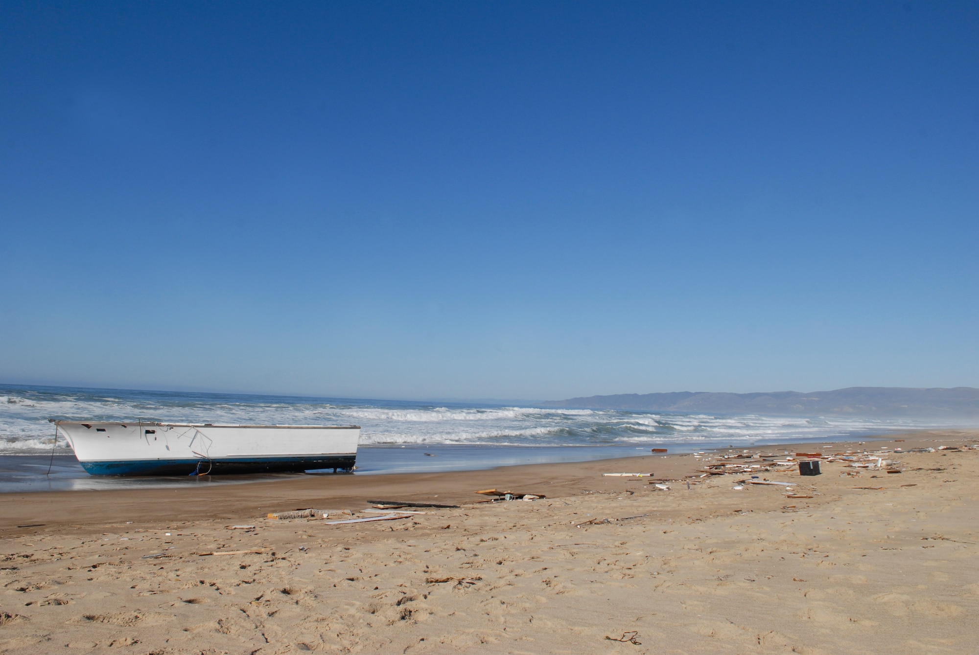 VANDENBERG AIR FORCE BASE, Calif. – Washed ashore, wreckage is left behind after a boating accident that occurred at Minuteman Beach here Tuesday, Nov. 24, 2009. Vandenberg’s emergency responders have reported one dead and one injured survivor from the boating accident off of the coast of Minuteman Beach. (U.S. Air Force photo/Senior Airman Andrew Satran)   