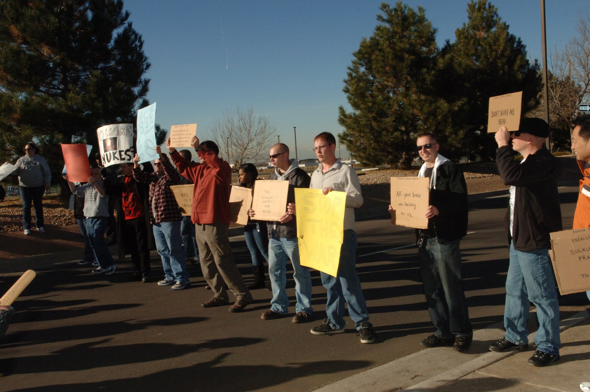 BUCKLEY AIR FORCE BASE, Colo. -- Volunteer mock protesters challenge barriers during an exercise Nov. 24. (U. S. photo by Tech. Sgt Shirley Henderson)