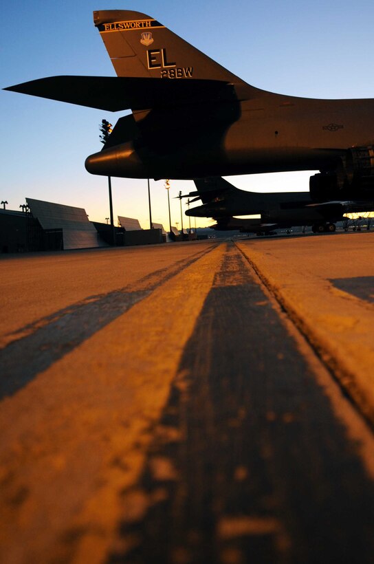 ELLSWORTH AIR FORCE BASE, S.D.-- B-1B Lancers sit on the flightline Nov. 23. The B-1 can rapidly deliver massive quantities of precision and non-precision weapons against any adversary, anywhere in the world. (U.S. Air Force photo/Airman 1st Class Corey Hook)