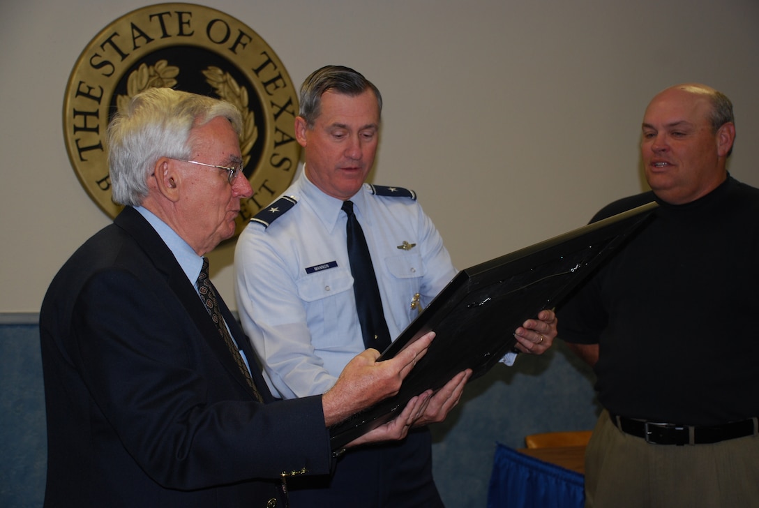 Burburnett, Texas Mayor Carl Law accepts a "thank you" presentation from 82nd Training Wing Commander Brig. Gen. O.G. Mannon for the city's role in the 50-year-old Squadron Adopter Program. (U.S. Air Force photo/Debi Smith)  