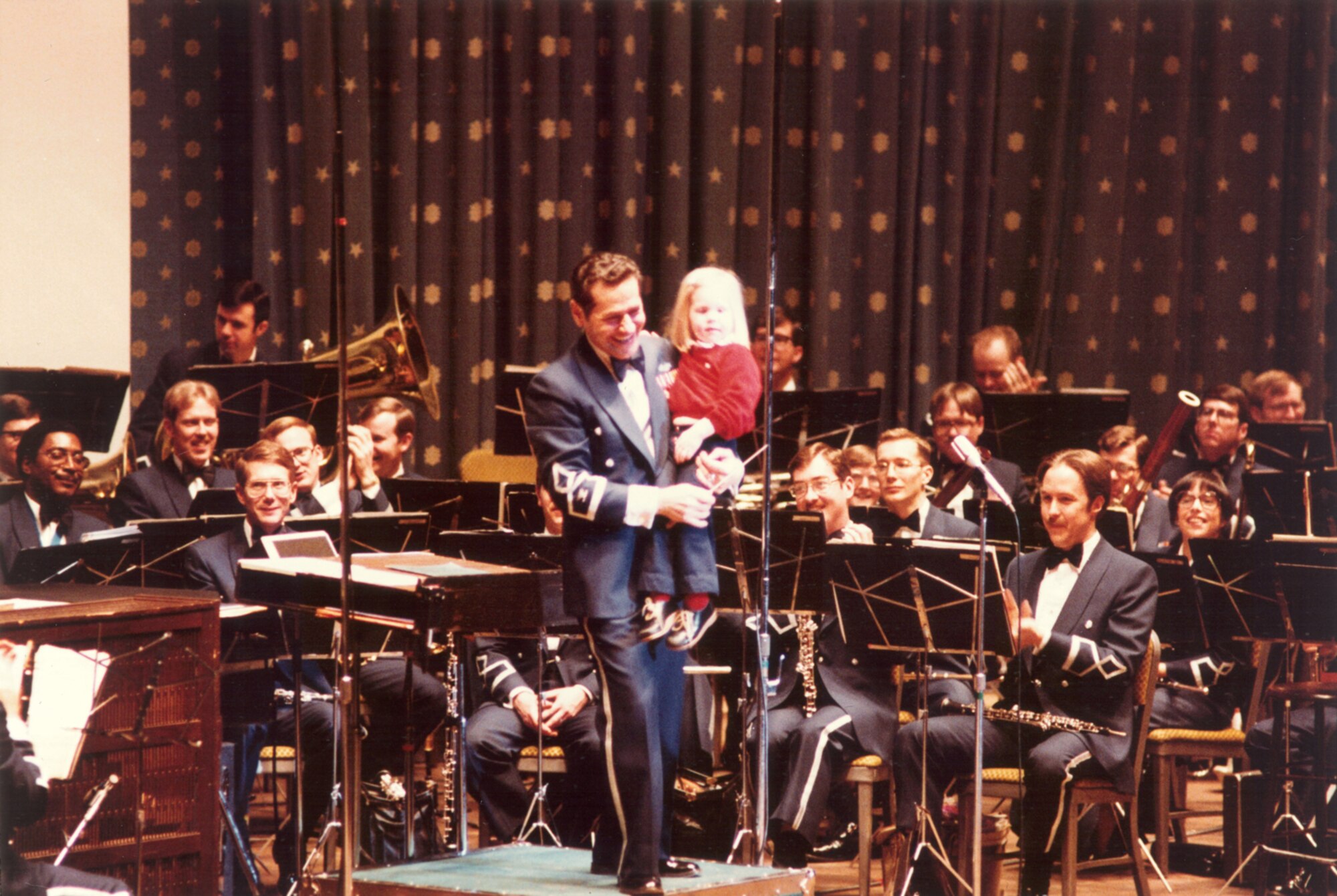 Colonel Arnald D. Gabriel and members of The USAF Band on stage at Constitution Hall, March 1, 1981.  If you have any additional behind-the-scenes stories from this event or memories to share, please email Band Historian <a href="mailto:usafbandhistorian@afncr.af.mil">Technical Sgt. Tracey MacDonald</a>.  This is Photo 21. (Gabriel Collection Photo)