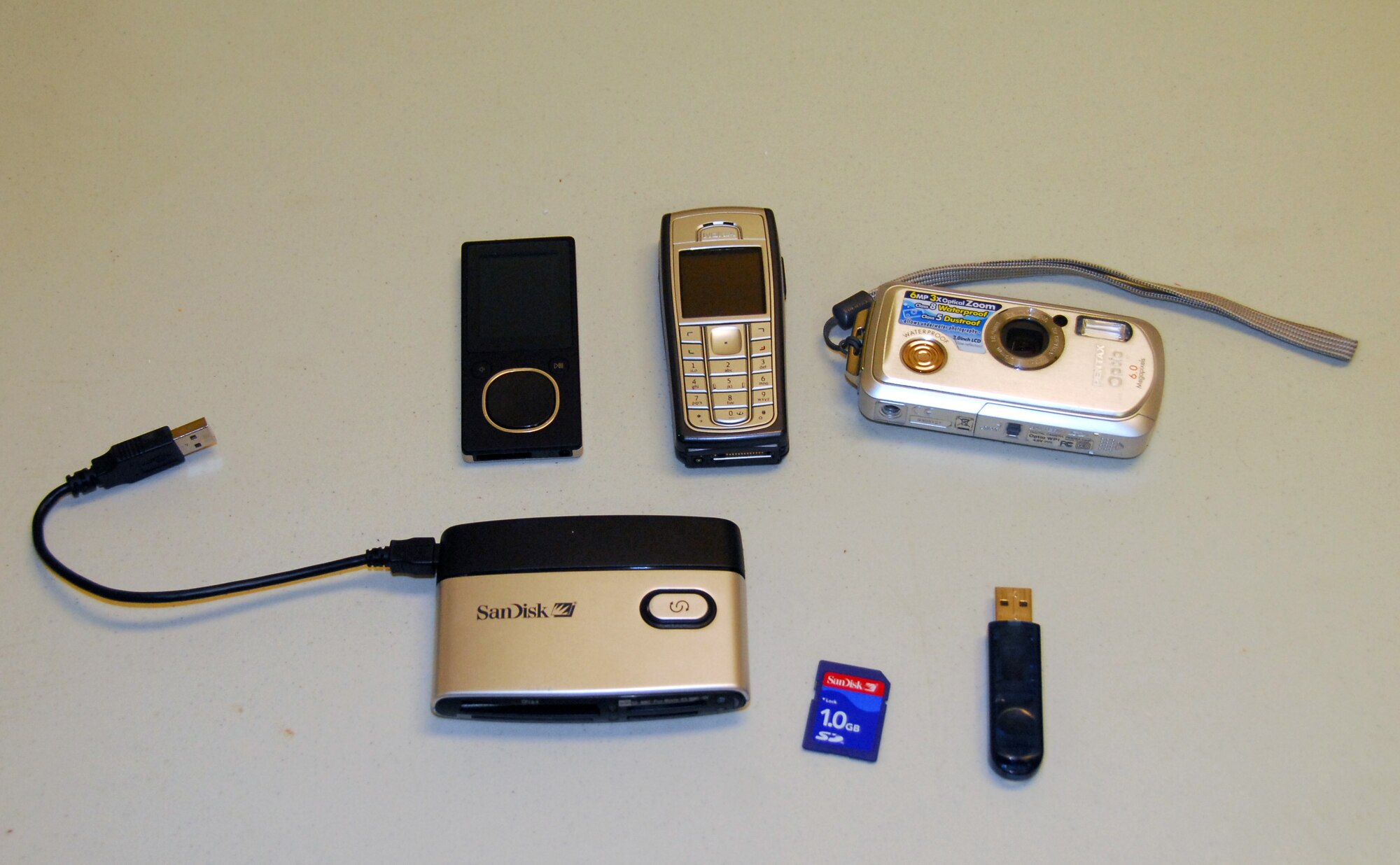 Thumb drives, USB devices and other types of flash media to include cameras, cell phones, Blackberries, iPods and iPhones have been banned from the Department of Defense network since November 2008. Personnel using any of the itmes are directly violating both the Department of Defense network policy and order of the Chief of Staff of the Air Force.(U.S. Air Force photo/Tech. Sgt. Shad Eidson)