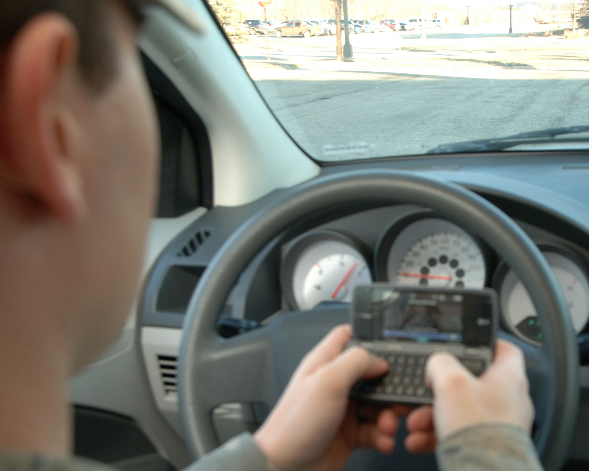 Effective Oct. 1 all federal employees, including Airmen and civilians here at Grand Forks Air Force Base, are prohibited from text messaging while driving government-owned vehicles or while driving on official business. (U.S. Air Force photo by Senior Airman R. Michael Longoria)