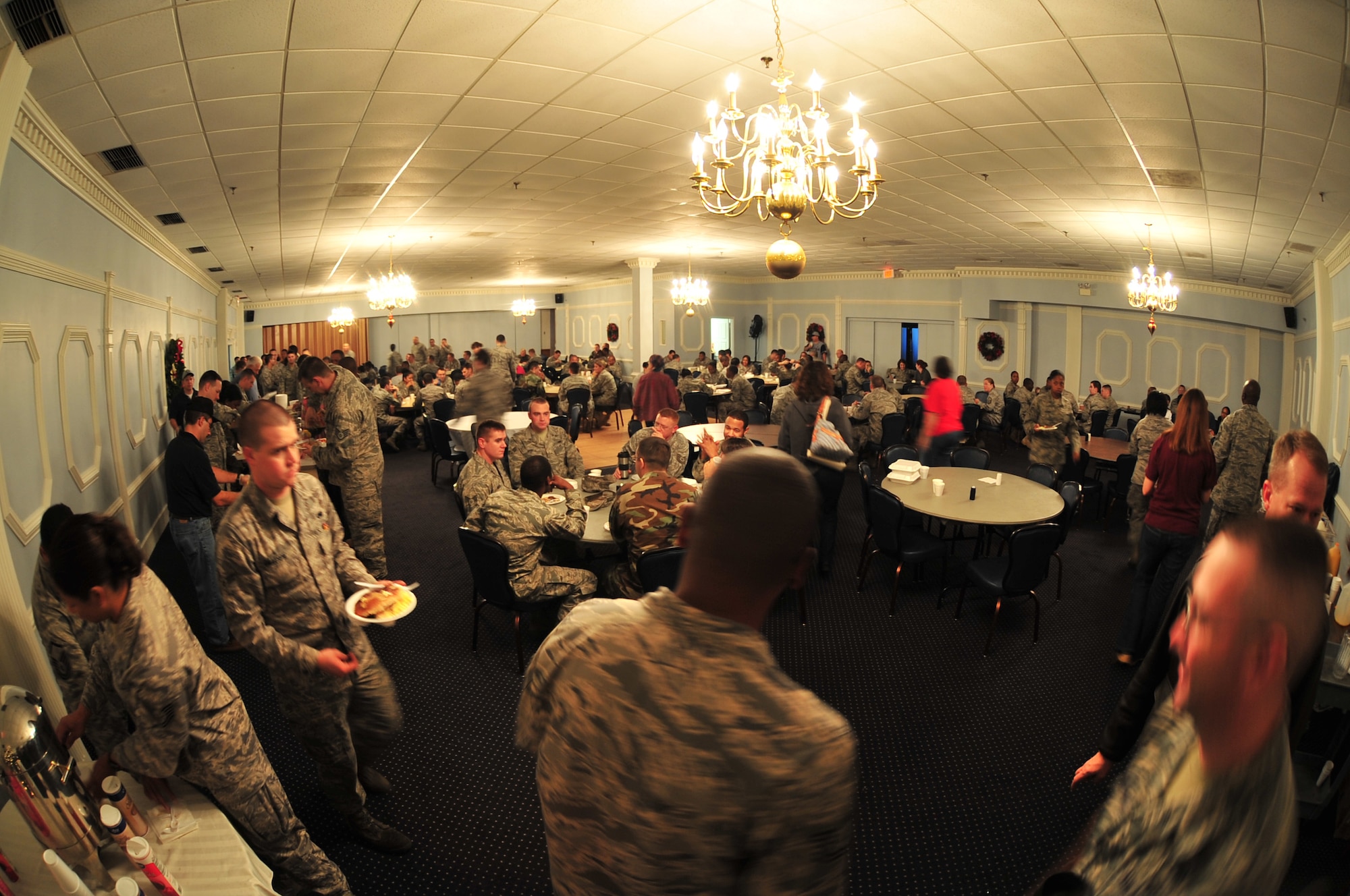Airmen from the 4th Fighter Wing gather in the consolidated club ball room to enjoy a Chief's Pancake Breakfast on Seymour Johnson Air Force Base, N.C., Nov. 20, 2009. The Chief's Group served more than 700 Airmen during breakfast. The money raised will go toward events for the enlisted Airmen stationed on Seymour Johnson. (U.S. Air Force photo/Airman 1st Class Rae Perry)