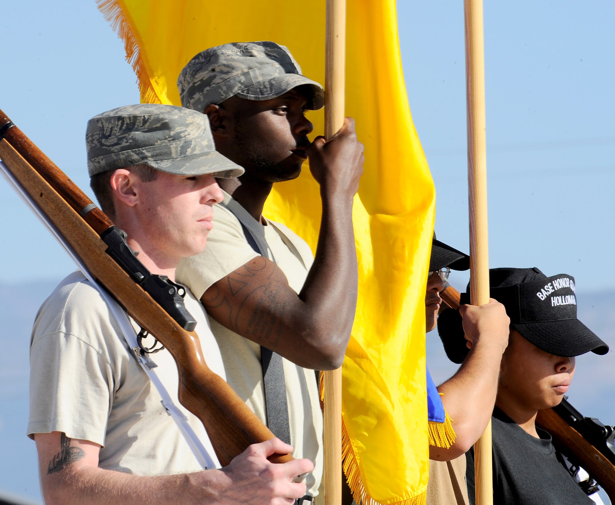 HOLLOMAN AIR FORCE BASE, N.M. -- Holloman's Steel Talon Honor Guard members carry flags and M1A Ceremonial rifles during a full day of practice here, Nov. 17. Flag bearers and rifle guards marched in line to perfect each of their movements. (U.S. Air Force photo by Airman 1st Class Veronica Stamps)