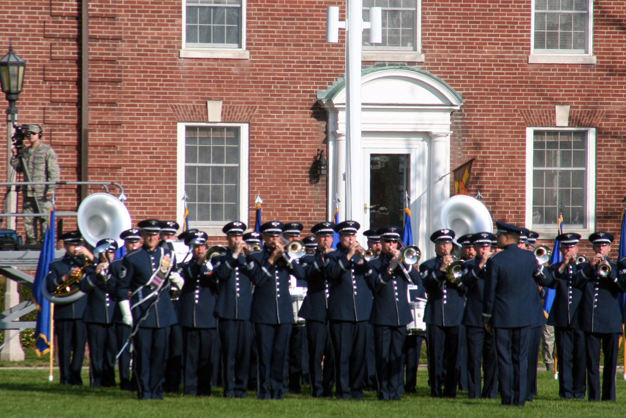Members of the U.S. Air Force Band of Mid-America perform during the Air Mobility Command change of command ceremony on Nov. 20, 2009, at Scott Air Force Base, Ill. The band played all the music related to the ceremony as Gen. Raymond E. Johns took command of AMC in the ceremony.  (U.S. Air Force Photo/Tech. Sgt. Scott T. Sturkol)