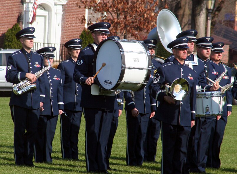 Members of the U.S. Air Force Band of Mid-America perform during the Air Mobility Command change of command ceremony on Nov. 20, 2009, at Scott Air Force Base, Ill. The band played all the music related to the ceremony as Gen. Raymond E. Johns took command of AMC in the ceremony.  (U.S. Air Force Photo/Tech. Sgt. Scott T. Sturkol)