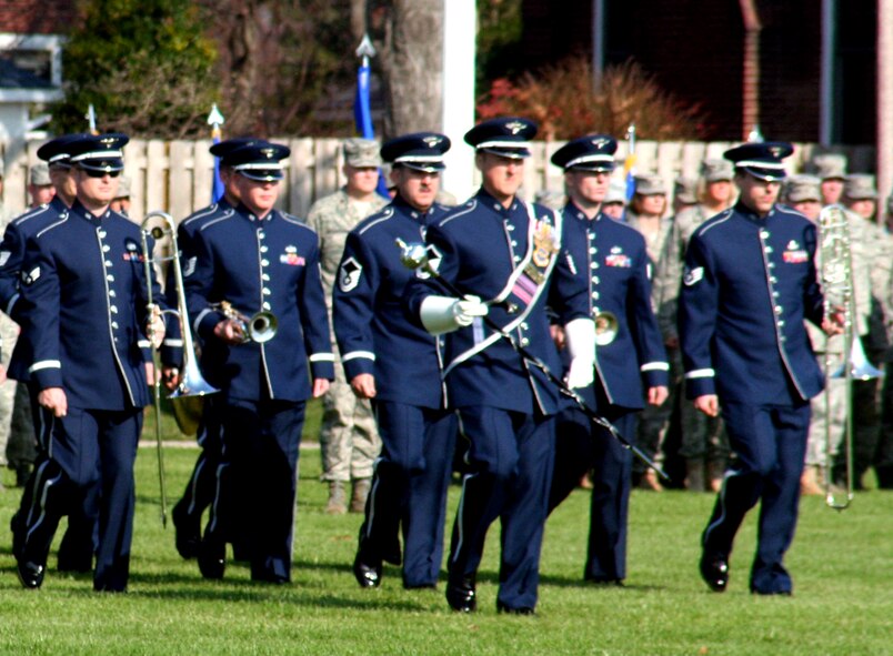 Members of the U.S. Air Force Band of Mid-America perform during the Air Mobility Command change of command ceremony on Nov. 20, 2009, at Scott Air Force Base, Ill. The band played all the music related to the ceremony as Gen. Raymond E. Johns took command of AMC in the ceremony.  (U.S. Air Force Photo/Tech. Sgt. Scott T. Sturkol)