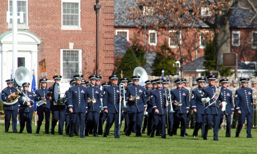 Members of the U.S. Air Force Band of Mid-America perform during the Air Mobility Command change of command ceremony on Nov. 20, 2009, at Scott Air Force Base, Ill. The band played all the music related to the ceremony as Gen. Raymond E. Johns took command of AMC in the ceremony.  (U.S. Air Force Photo/Tech. Sgt. Scott T. Sturkol)