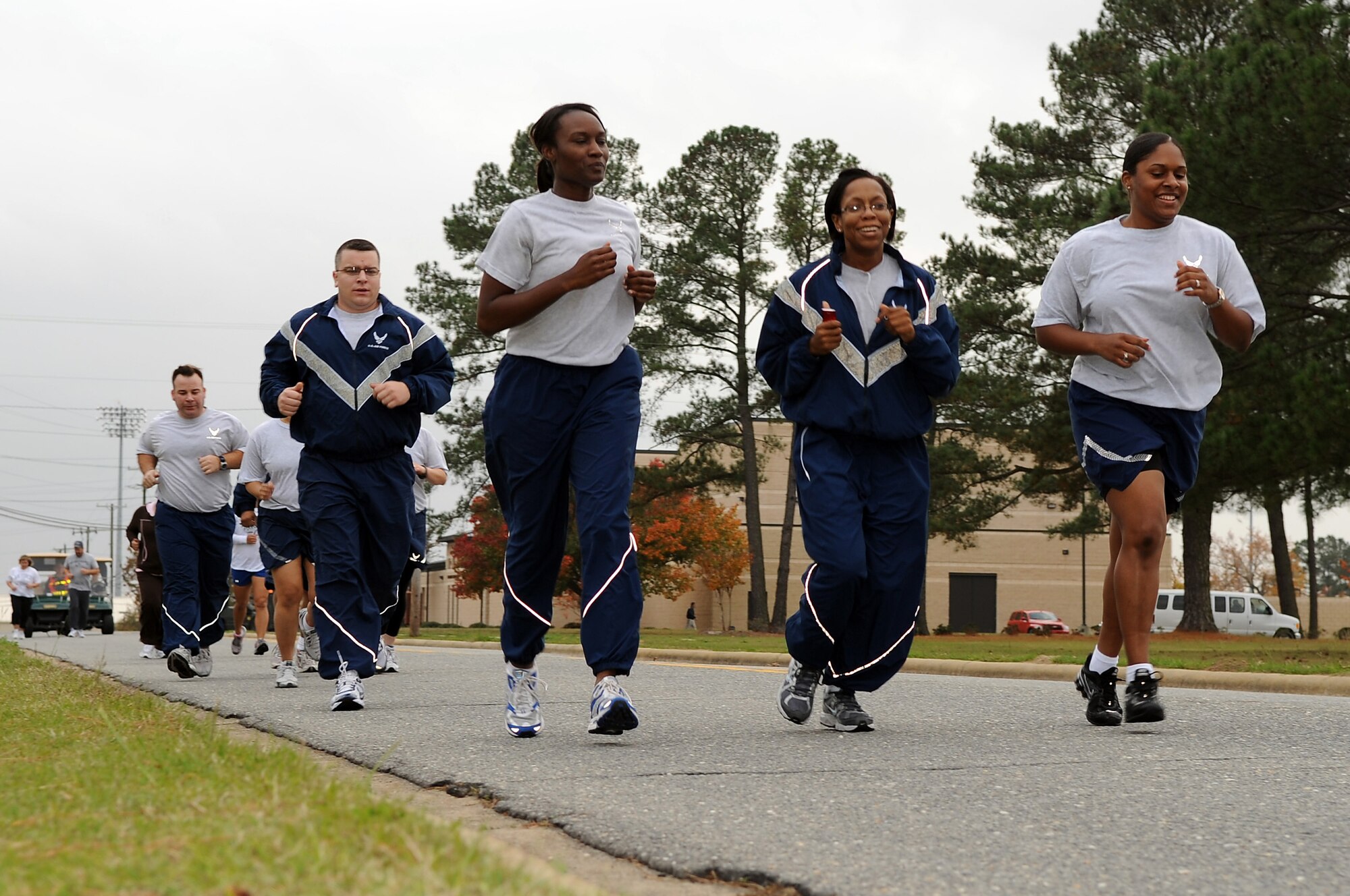 Seymour Johnson Air Force Base Airmen jog during the annual 5K and 10K Turkey Trot, Nov. 20, 2009. The first and second place male and female winners from both races received a free turkey, trophy, t-shirt and healthy snack bag. (U.S. Air Force photo/Senior Airman Courtney Richardson)