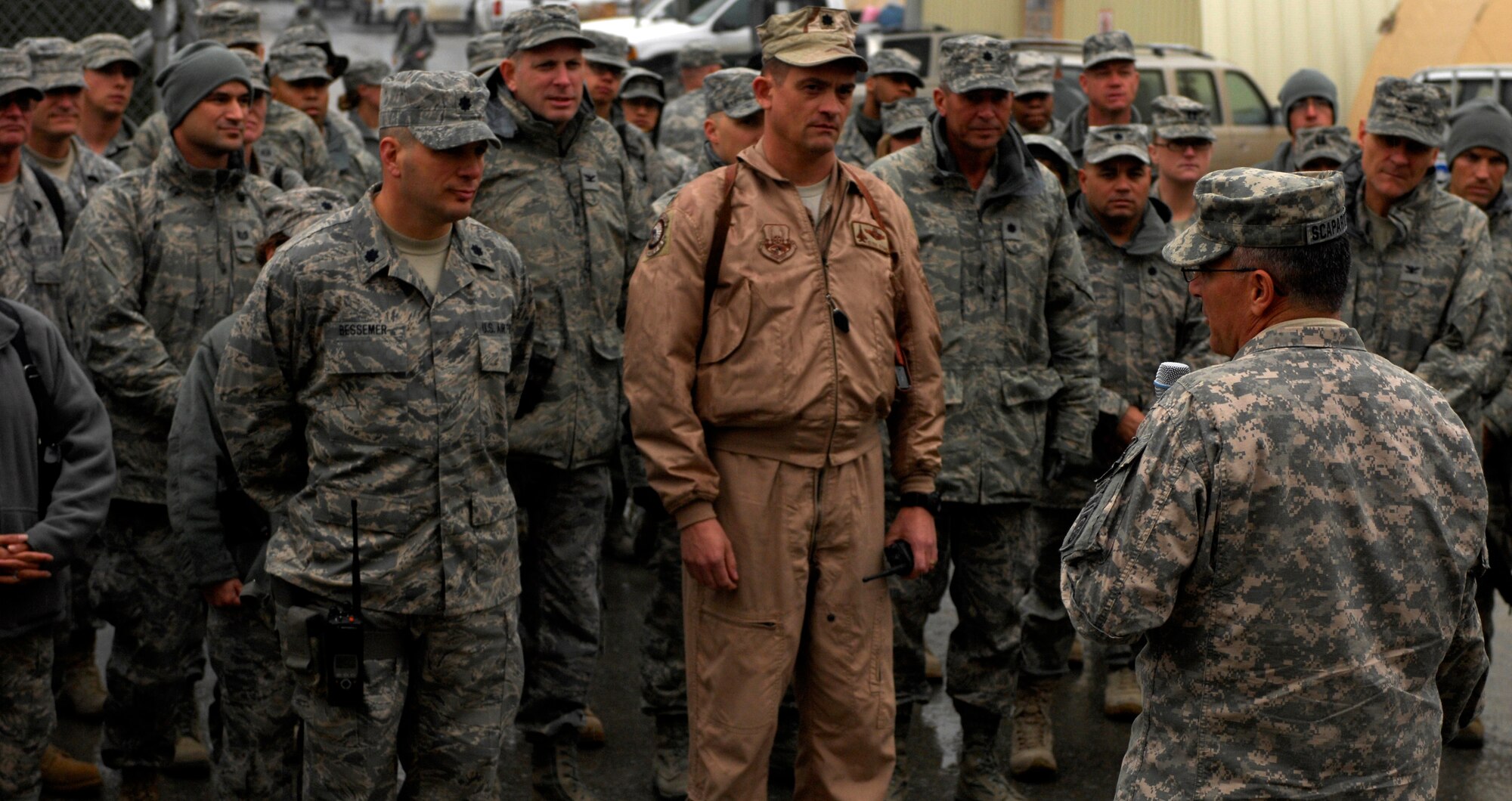 BAGRAM AIRFIELD, Afghanistan -- Senior Army leaders from Combined Joint Task Force - 82 address a crowd of Airmen in front of 455th Air Expeditionary Wing headquarters Nov. 23, 2009. Maj. Gen. Curtis Scaparrotti, CJTF-82 commander, and Command Sgt. Major Thomas Capel thanked them for their contributions to the mission in Afghanistan. "We know your families miss you, but it's important for us to be here," General Scaparrotti said. "Soldiers and Marines on the ground know they can rely on Airmen to bring them air power when they need it." (U.S. Air Force photo/Staff Sgt. J.G. Buzanowski)
